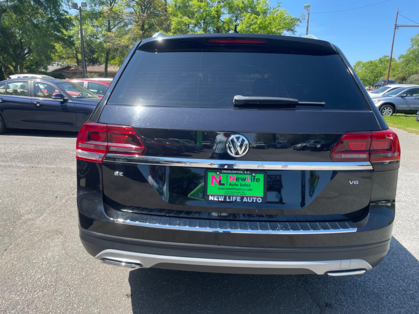 2019 BLACK VOLKSWAGEN ATLAS V6 SE (1V2DR2CA0KC) with an 3.6L engine, Automatic transmission, located at 5103 Dorchester Rd., Charleston, SC, 29418-5607, (843) 767-1122, 36.245171, -115.228050 - Local Trade-in with Leather, Third Row, Backup Camera, AUX/Bluetooth/USB, Dual Climate Control, Power Everything (windows, locks, seats, mirrors), Heated Seats, Rear In-door Sunshades, Push Button Start, Keyless Entry, Alloy Wheels. 121k miles Located at New Life Auto Sales! 2023 WINNER for Post & - Photo #5